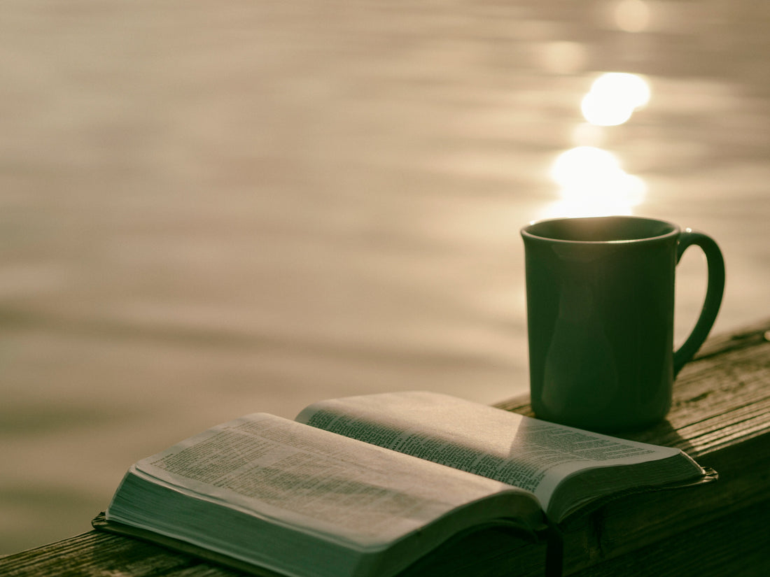 Bible and Coffee Photo by Aaron Burden on Unsplash