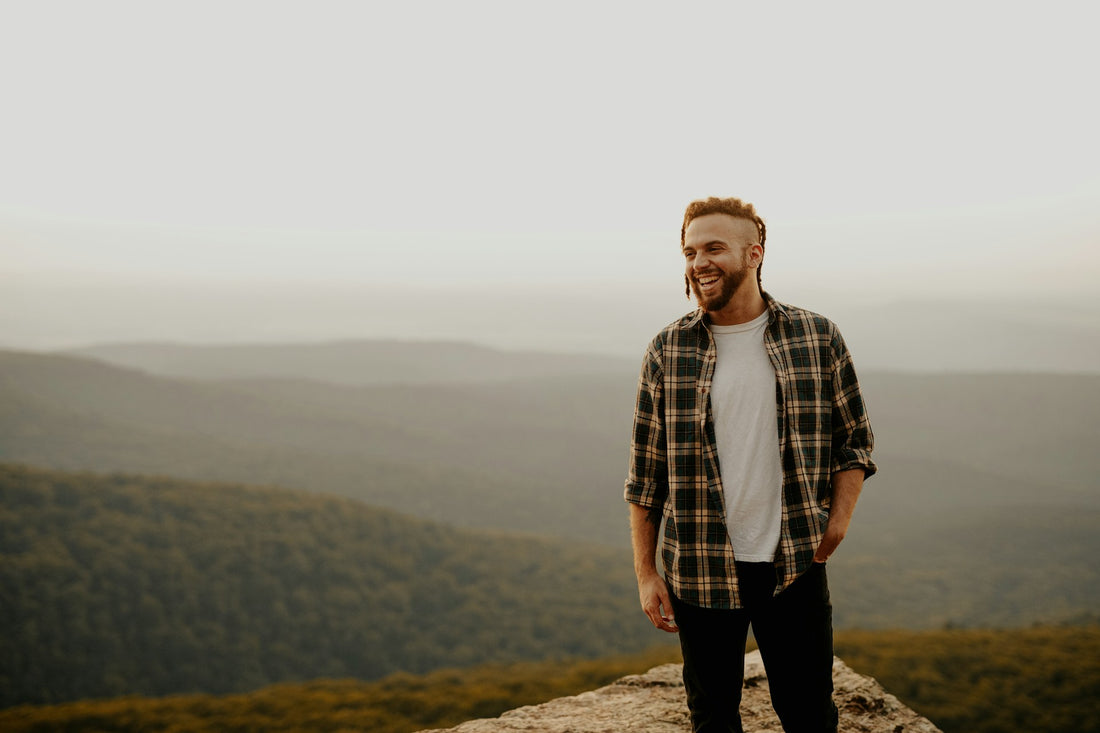 Man on a Mountain Photo by Brooke Cagle on Unsplash