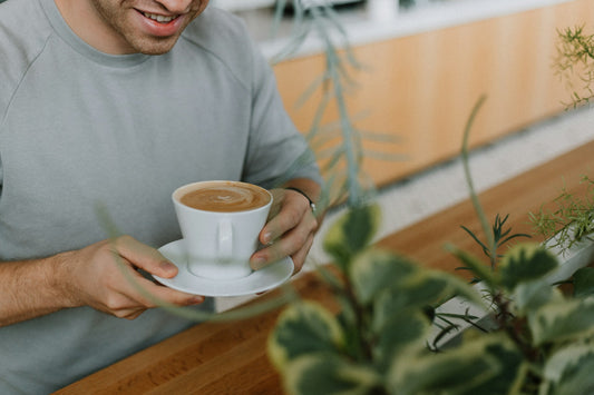 Man with Coffee Photo by Priscilla Du Preez 🇨🇦 on Unsplash